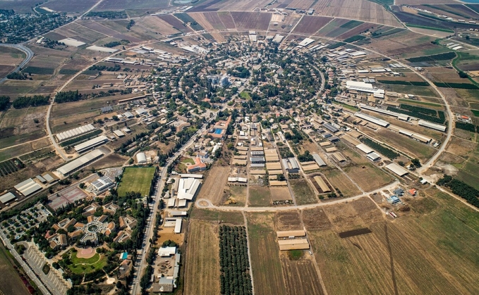 A typical kibbutz is a community in Israel usually centred around a dairy farm A typical kibbutz is a community in Israel usually centred around a dairy farm